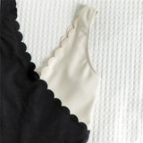 Women's One Piece Black and White Asymmetrical Knit Swimsuit