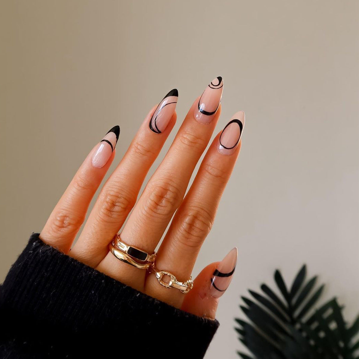 Women's Nude Almond Nail Set with Black Accent Details