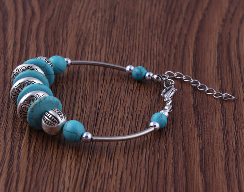 Turquoise and Metal Rings Bracelet