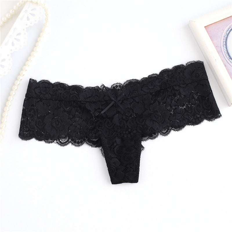 Panty de string de jupe large en dentelle florale