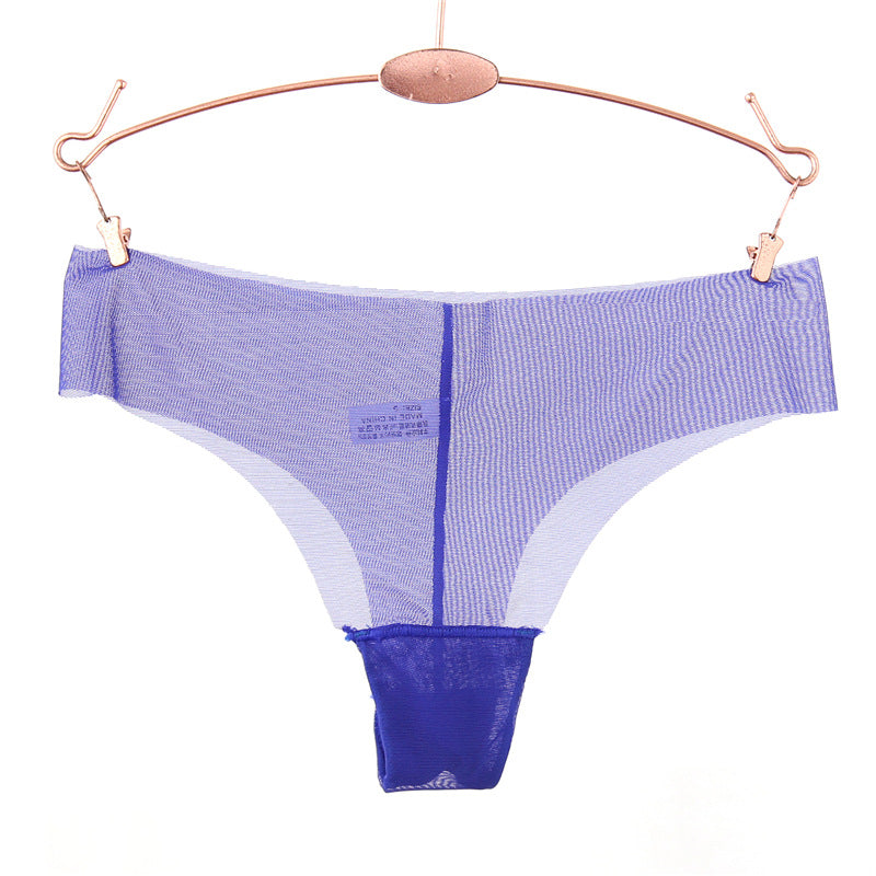 Panty string en maille transparente du bord brut