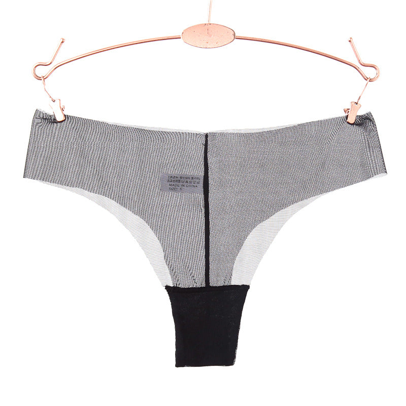 Panty string en maille transparente du bord brut