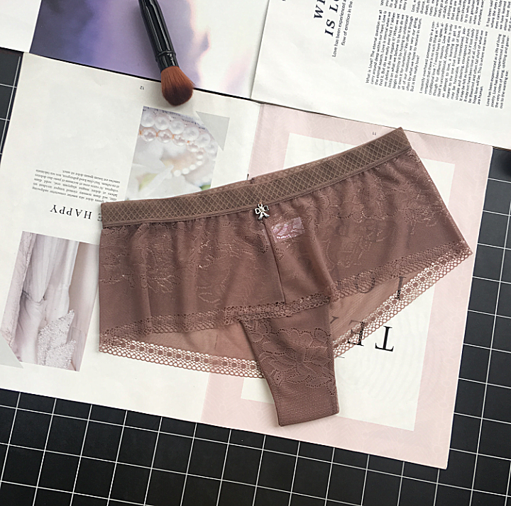 Calcinha semi -pura Ultra Soft com detalhamento de jóias