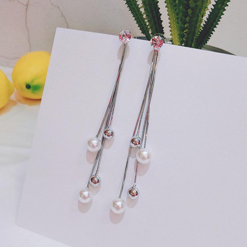 Boucles d'oreilles brillantes brillantes